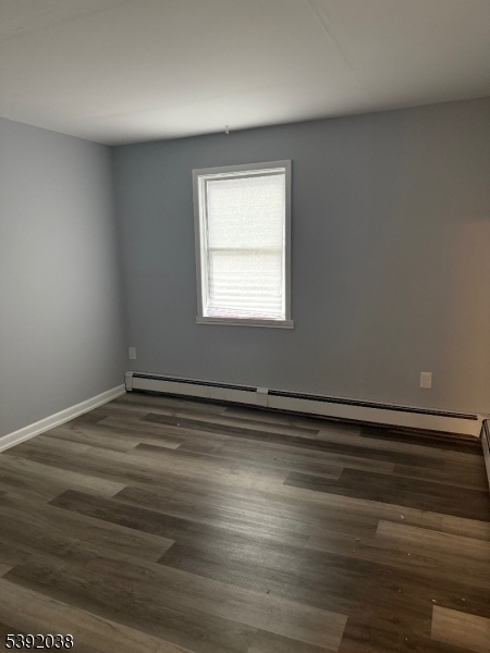 174 Main Street, Unit 2L Franklin, NJ 07416 - Photo 4 of 12 a view of a room with wooden floor and window