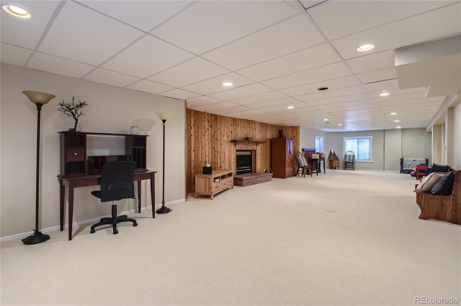 9212 Princeton Street Highlands Ranch, CO 80130 - Photo 36 of 40 a view of a room with gym equipment