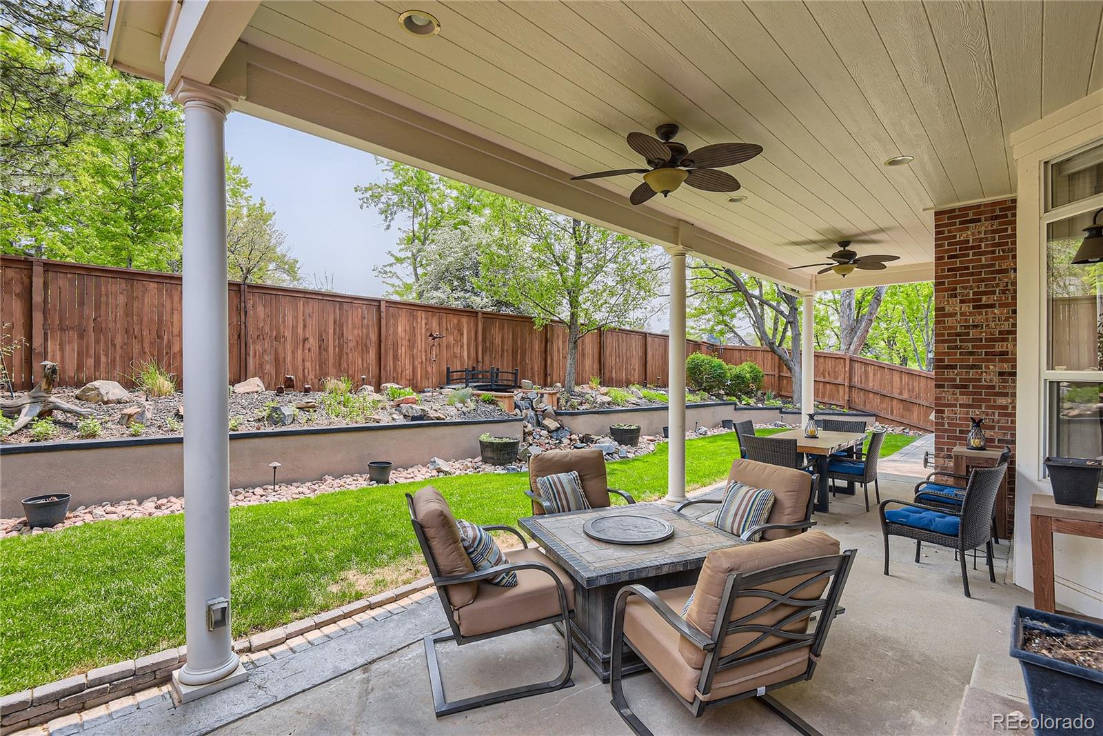 9212 Princeton Street Highlands Ranch, CO 80130 - Photo 37 of 40 a view of swimming pool with a patio