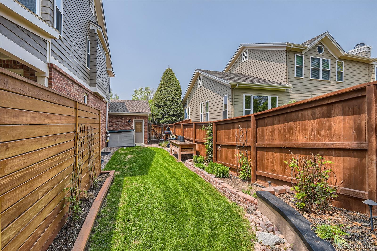 9212 Princeton Street Highlands Ranch, CO 80130 - Photo 40 of 40 a view of a house with brick walls