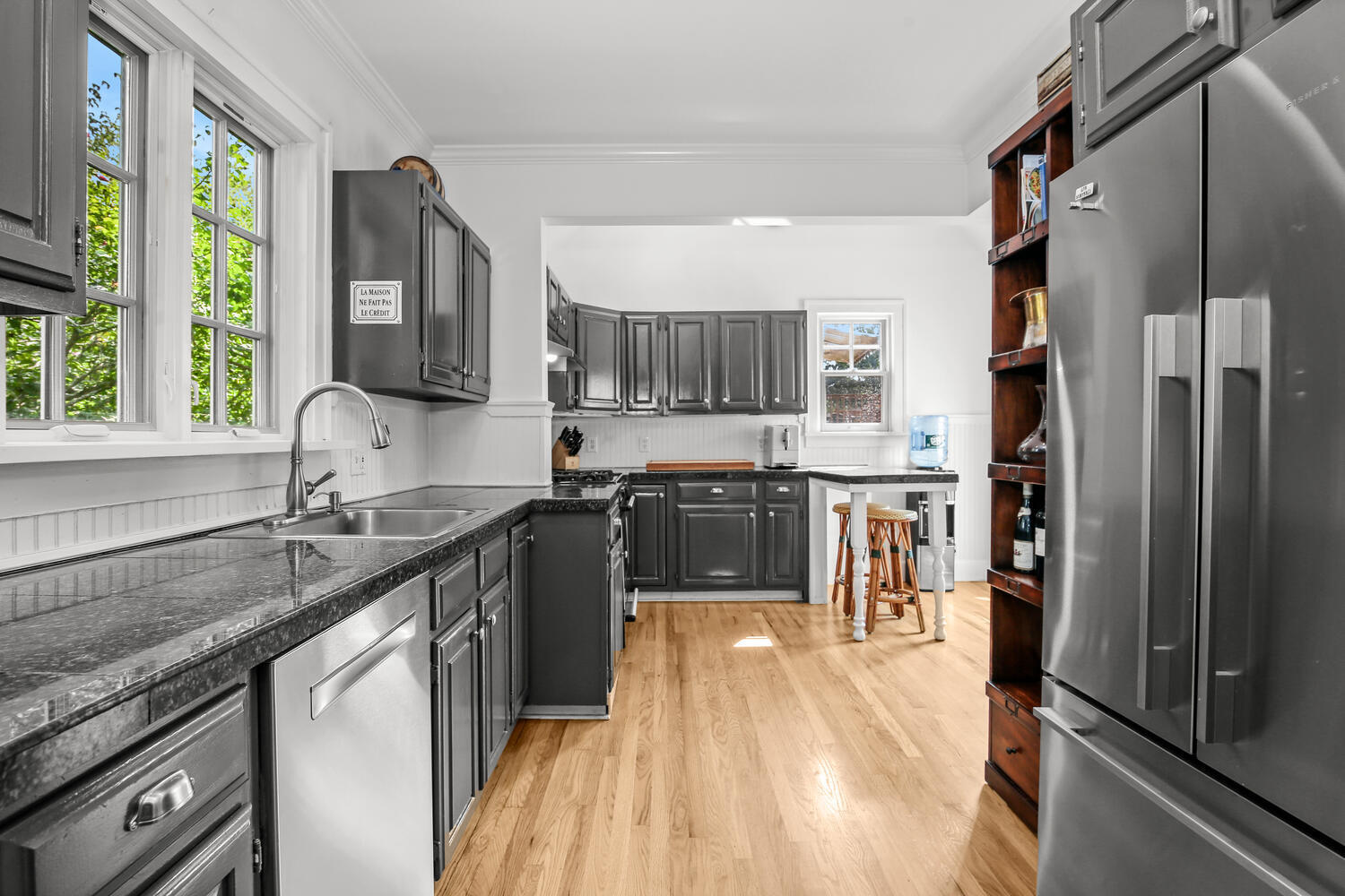 25 Butler Street Greenwich, CT 06807 - Photo 11 of 37 a kitchen with stainless steel appliances granite countertop a sink stove and refrigerator