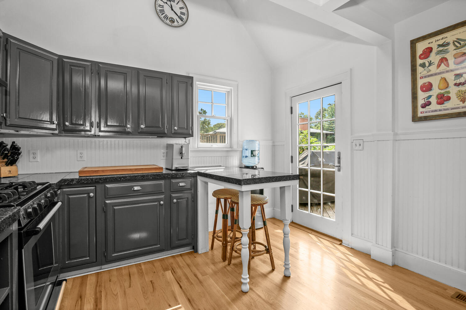 25 Butler Street Greenwich, CT 06807 - Photo 14 of 37 a kitchen with stainless steel appliances granite countertop a stove a sink and a microwave