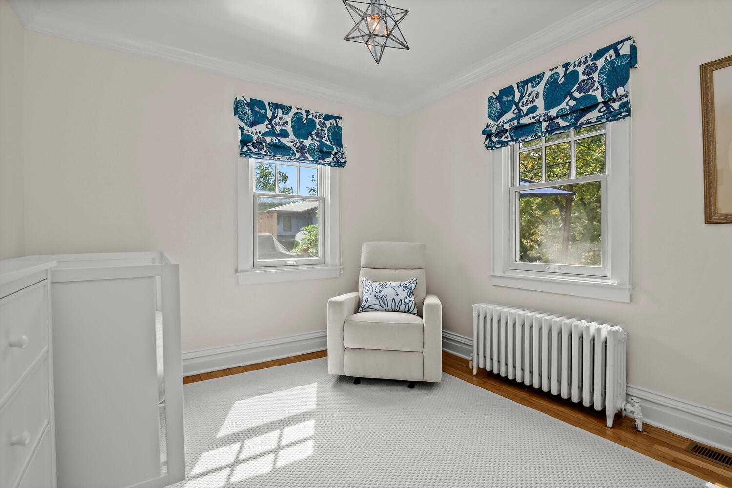 25 Butler Street Greenwich, CT 06807 - Photo 15 of 37 a bedroom with a bed and a window