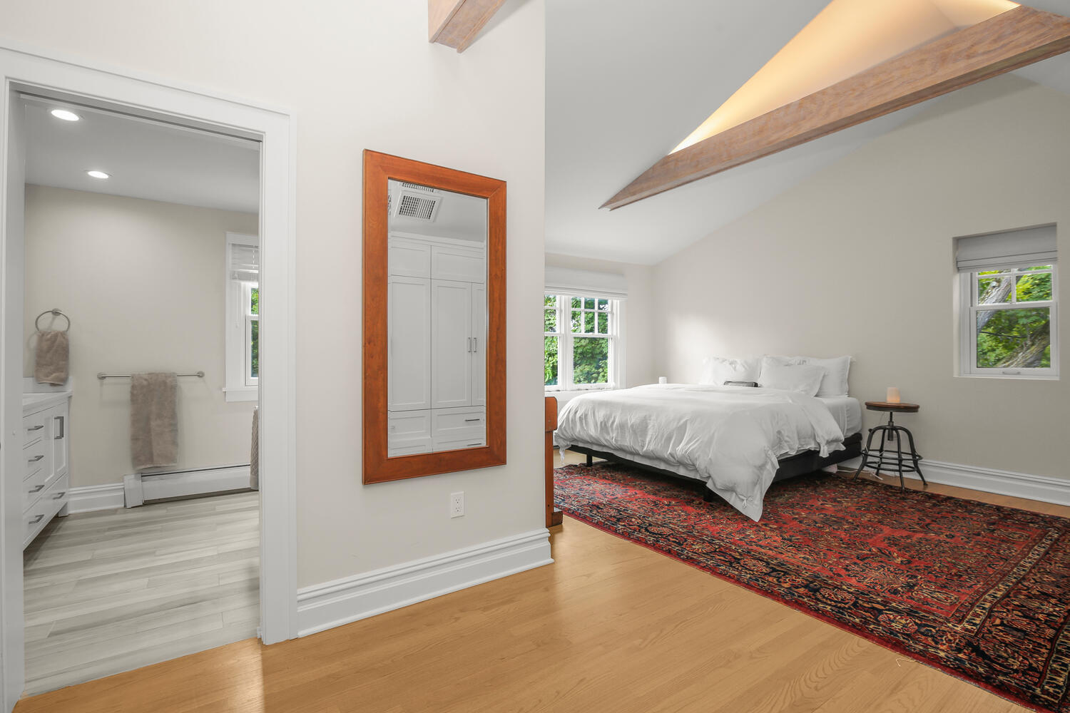 25 Butler Street Greenwich, CT 06807 - Photo 20 of 37 a bedroom with a bed and a window