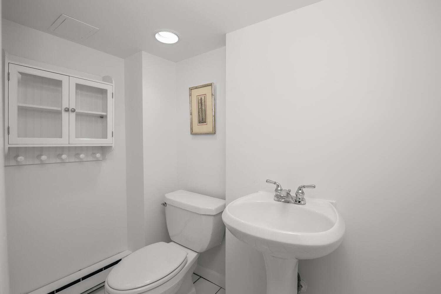 25 Butler Street Greenwich, CT 06807 - Photo 27 of 37 a bathroom with a sink toilet and a mirror