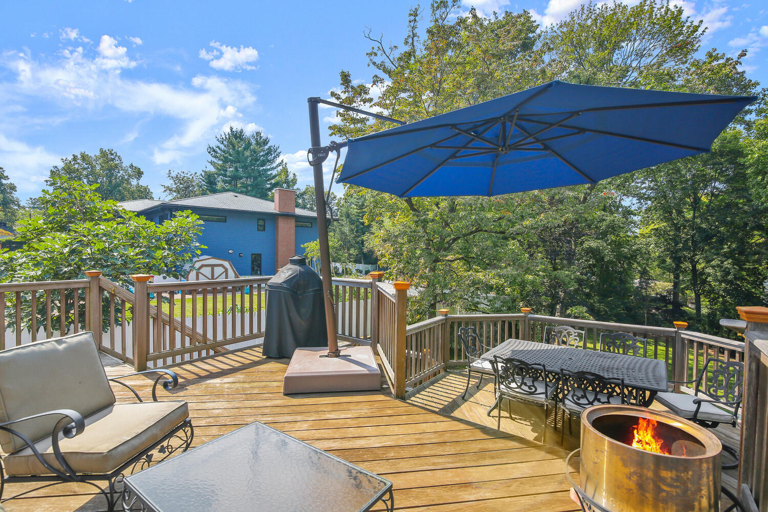25 Butler Street Greenwich, CT 06807 - Photo 30 of 37 a view of a chair and tables on the deck