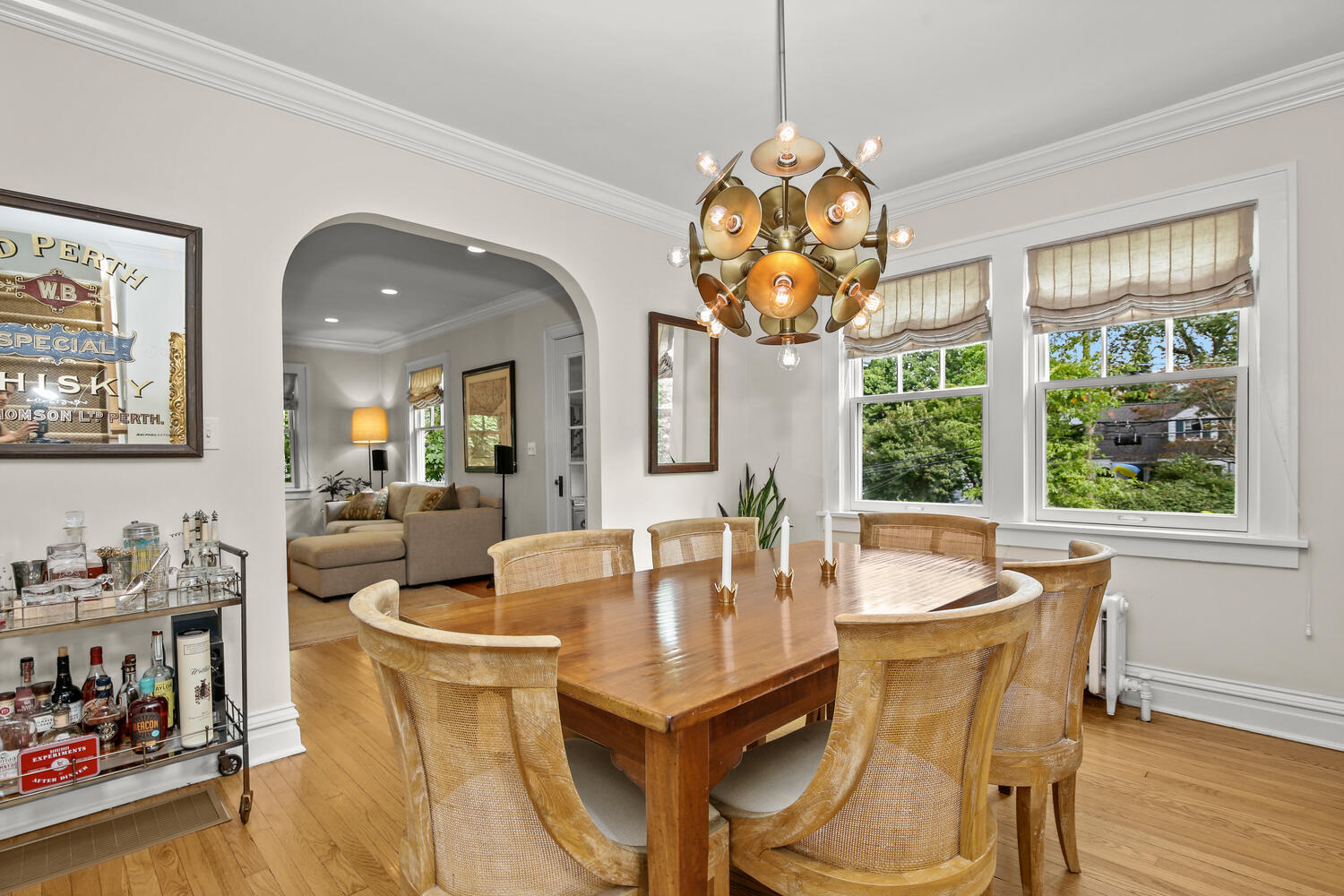 25 Butler Street Greenwich, CT 06807 - Photo 10 of 37 a view of a dining room with furniture a chandelier and wooden floor