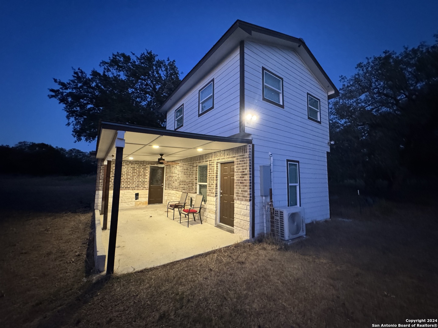 785 Way Cross Road San Antonio, TX 78264 - Photo 5 of 12 a view of a house with a backyard