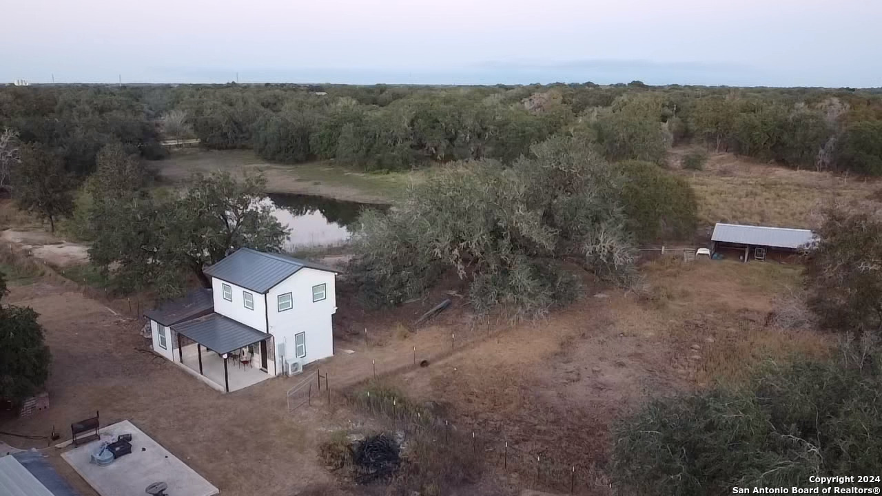 785 Way Cross Road San Antonio, TX 78264 - Photo 10 of 12 an aerial view of a house with a yard