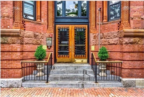 a view of a brick building with a window