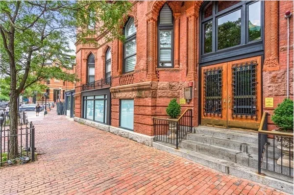 a view of a building with a porch