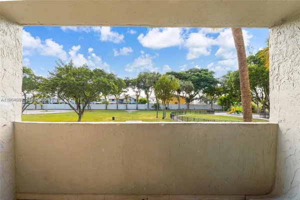 a view of swimming pool with outdoor space and seating area