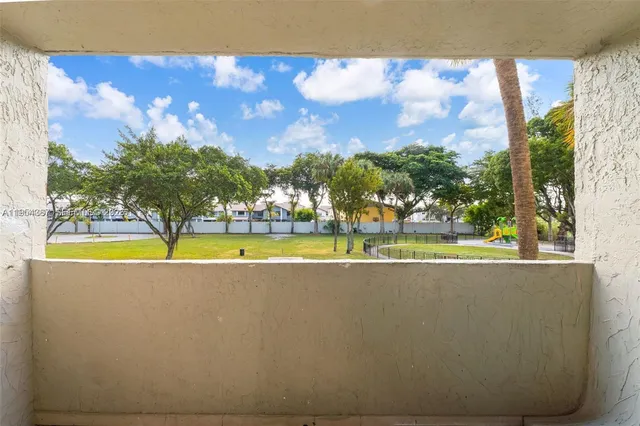 a view of swimming pool with outdoor space and seating area