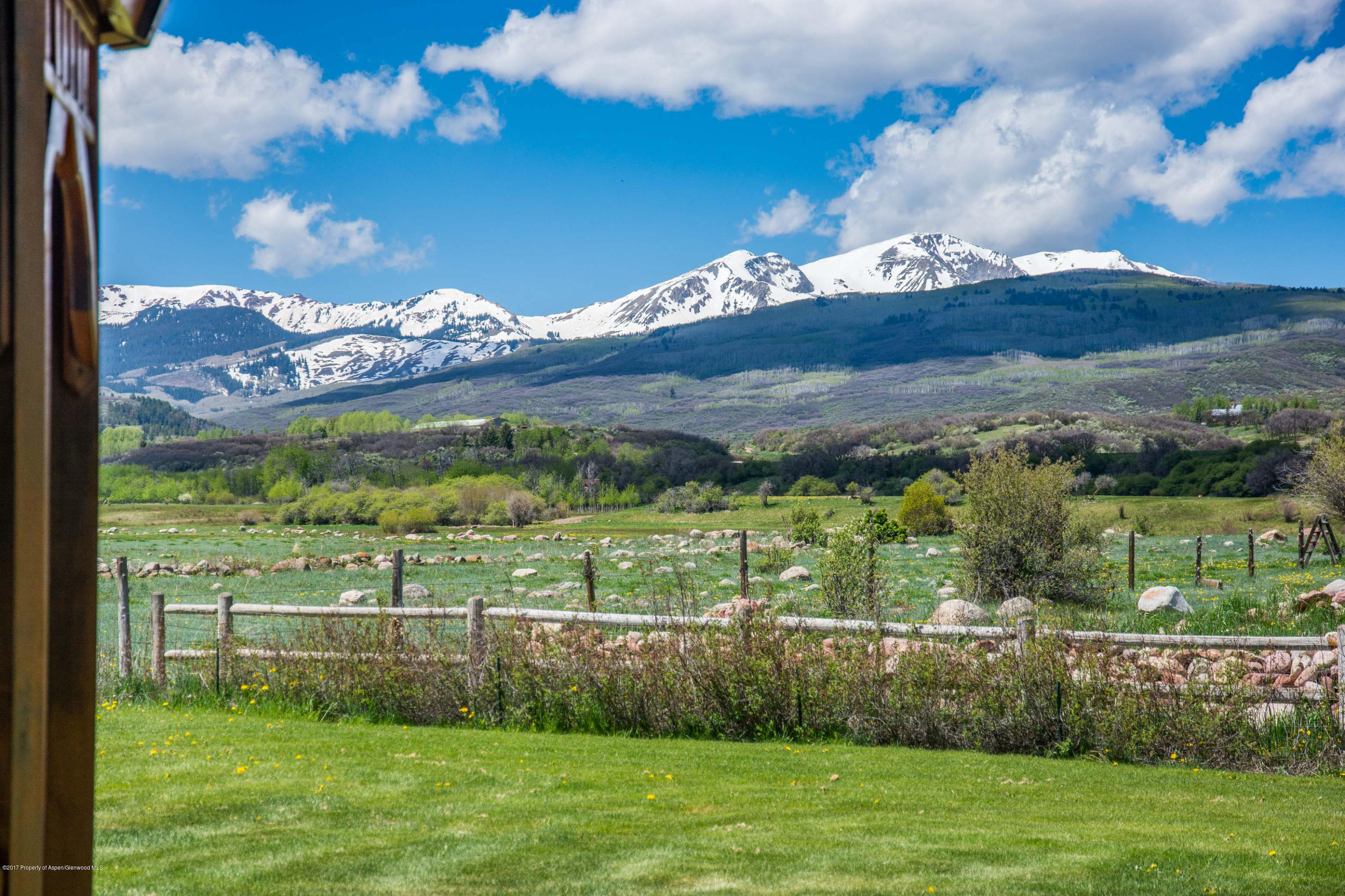 144 Haystack Lane Snowmass, CO 81654 - Photo 14 of 40 a view of a city with an ocean