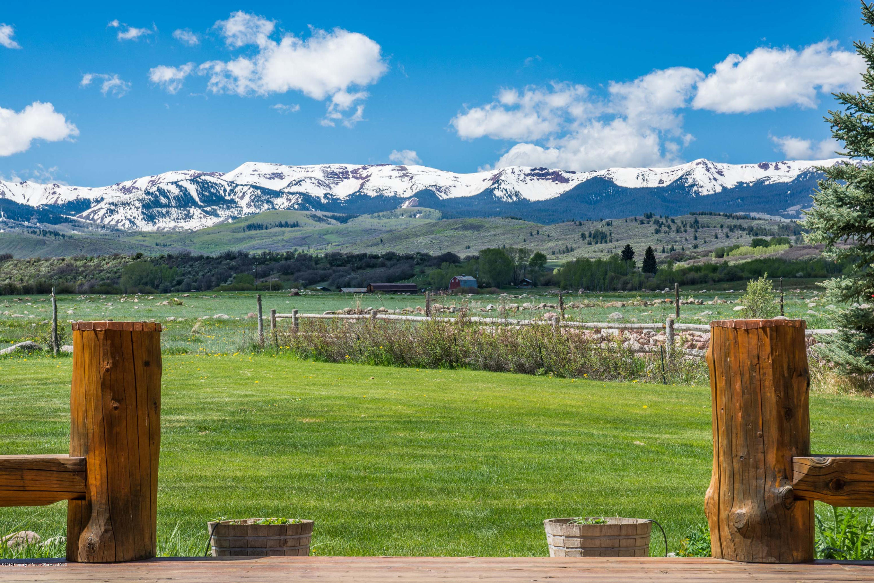 144 Haystack Lane Snowmass, CO 81654 - Photo 15 of 40 a view of a lake with a big yard