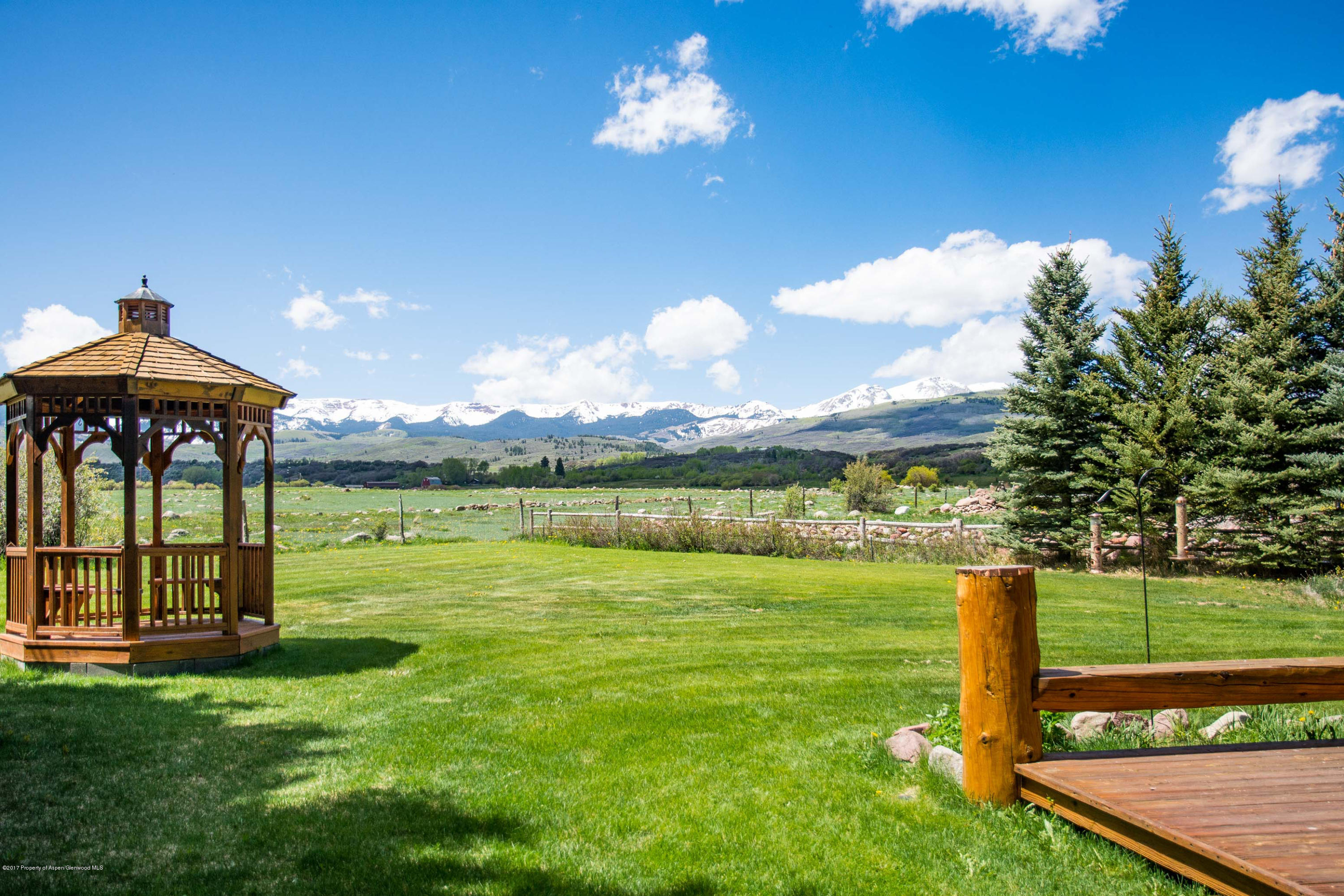 144 Haystack Lane Snowmass, CO 81654 - Photo 19 of 40 a view of a golf course with a garden