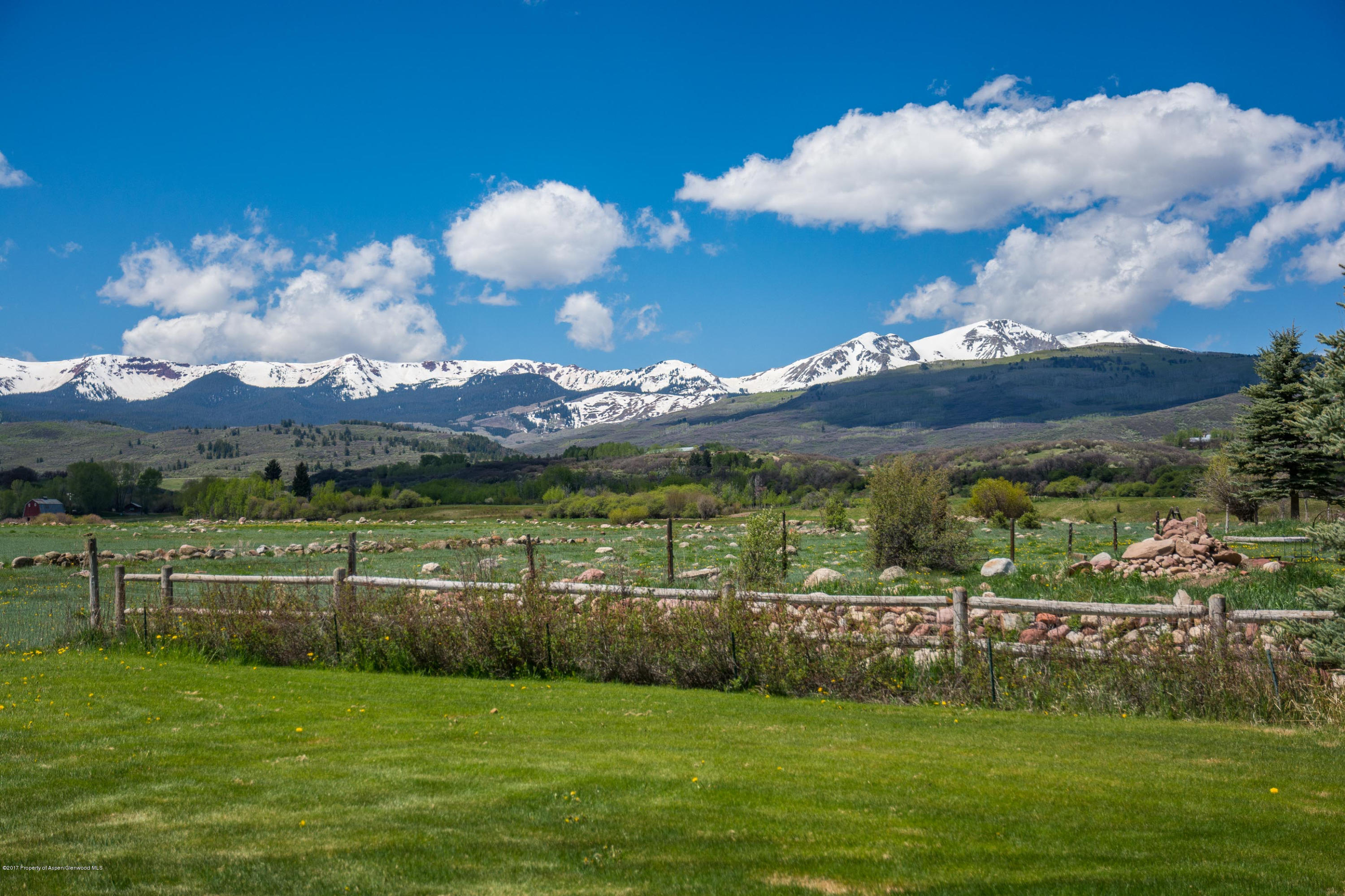 144 Haystack Lane Snowmass, CO 81654 - Photo 21 of 40 a view of a house with a big yard