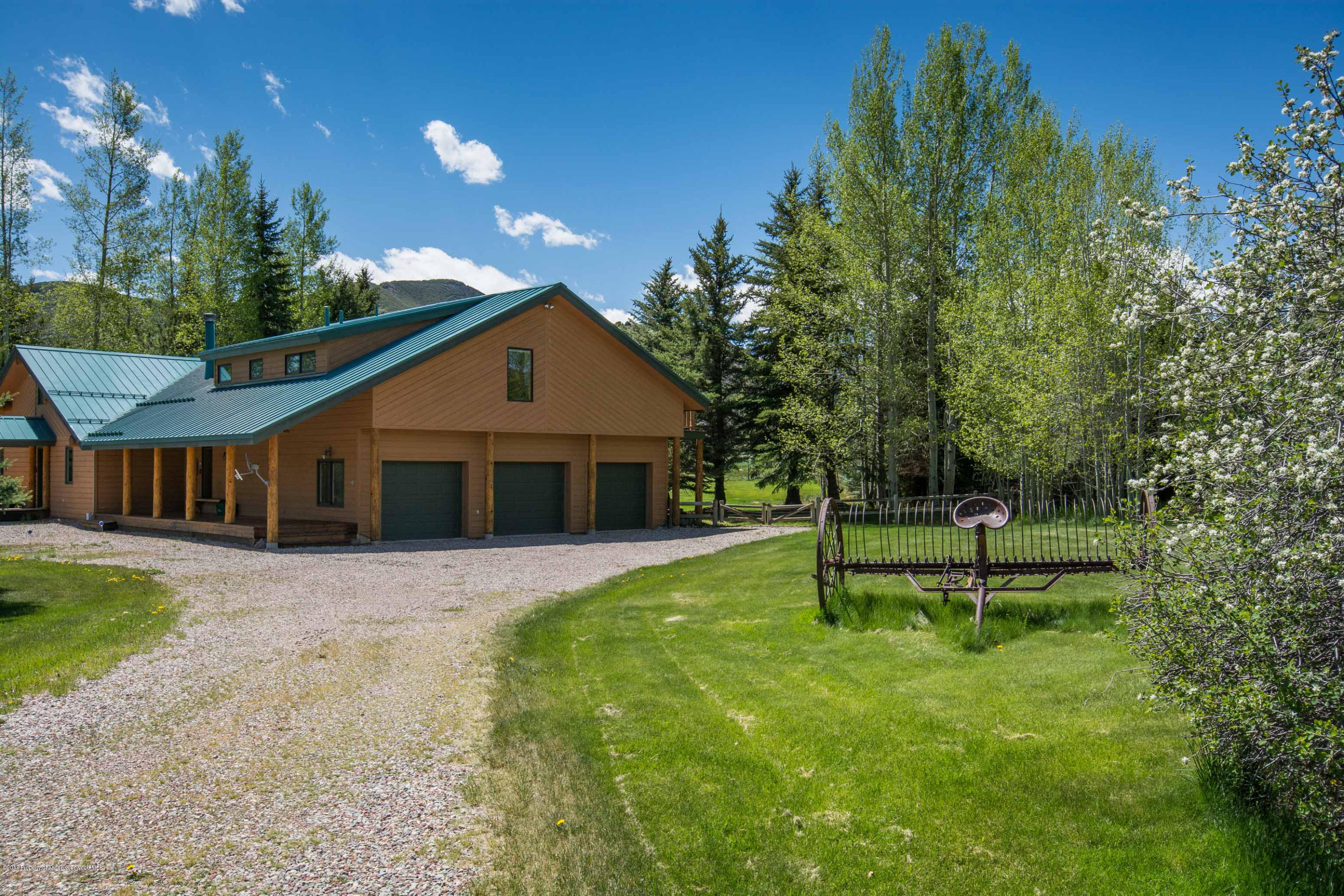 144 Haystack Lane Snowmass, CO 81654 - Photo 28 of 40 a house view with a garden space