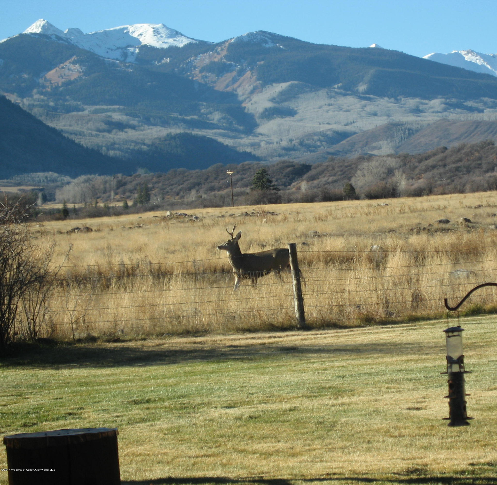 144 Haystack Lane Snowmass, CO 81654 - Photo 37 of 40 a view of a lake with a mountain in the background