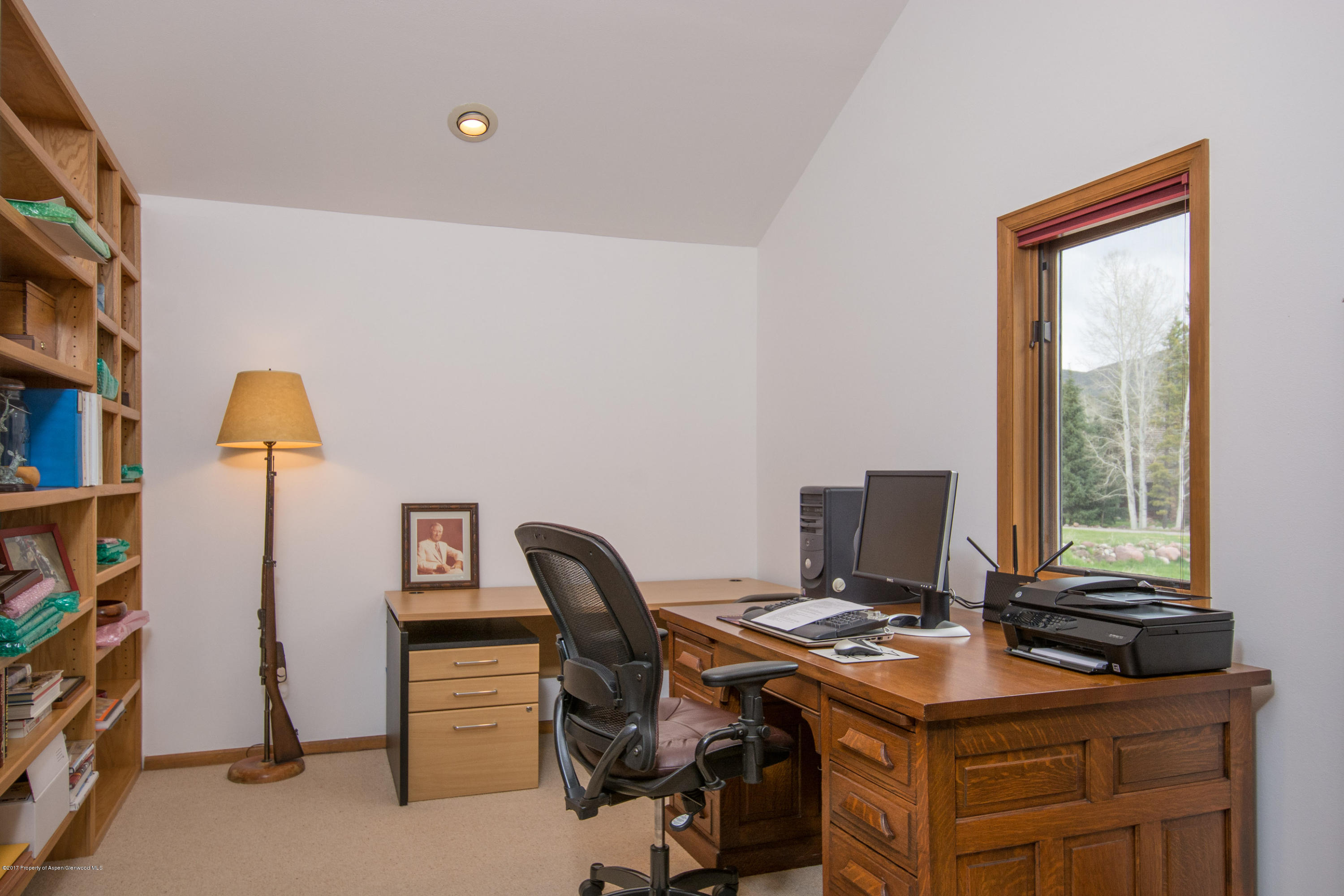 144 Haystack Lane Snowmass, CO 81654 - Photo 6 of 40 a view of a workspace with furniture and a window