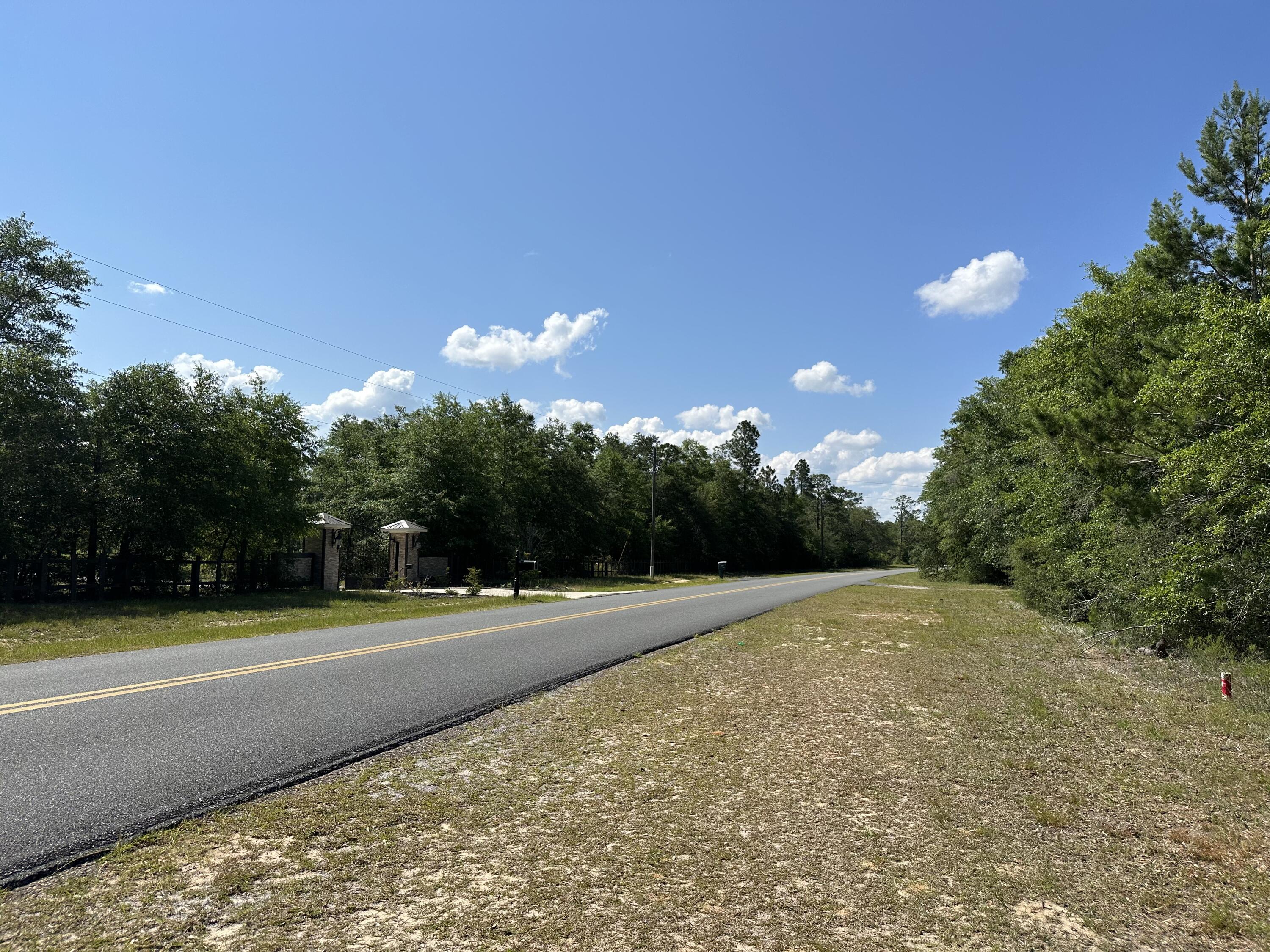 5570 Mt Olive Road Crestview, FL 32539 - Photo 24 of 34 a view of a tennis court