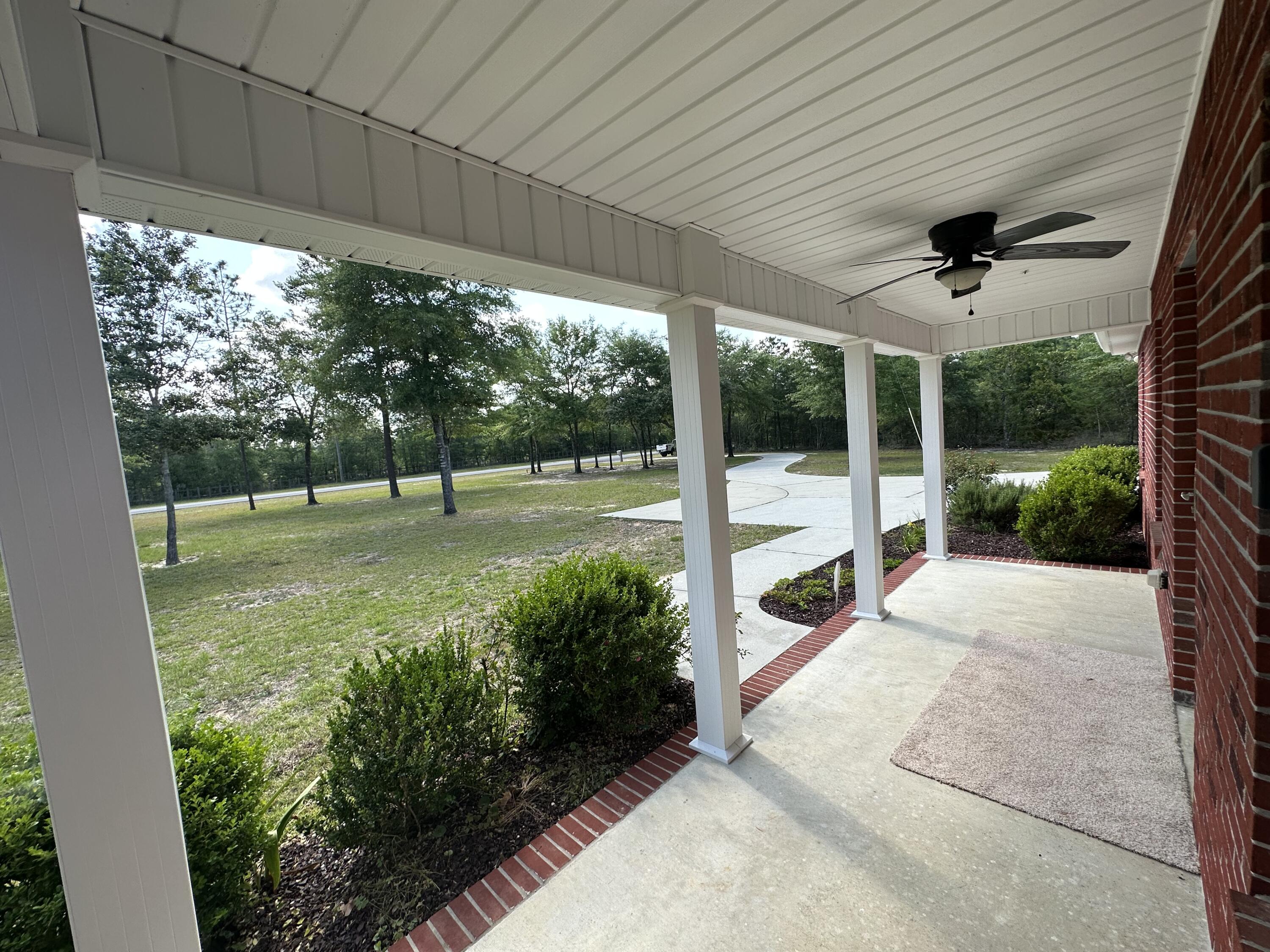5570 Mt Olive Road Crestview, FL 32539 - Photo 32 of 34 a view of a garden
