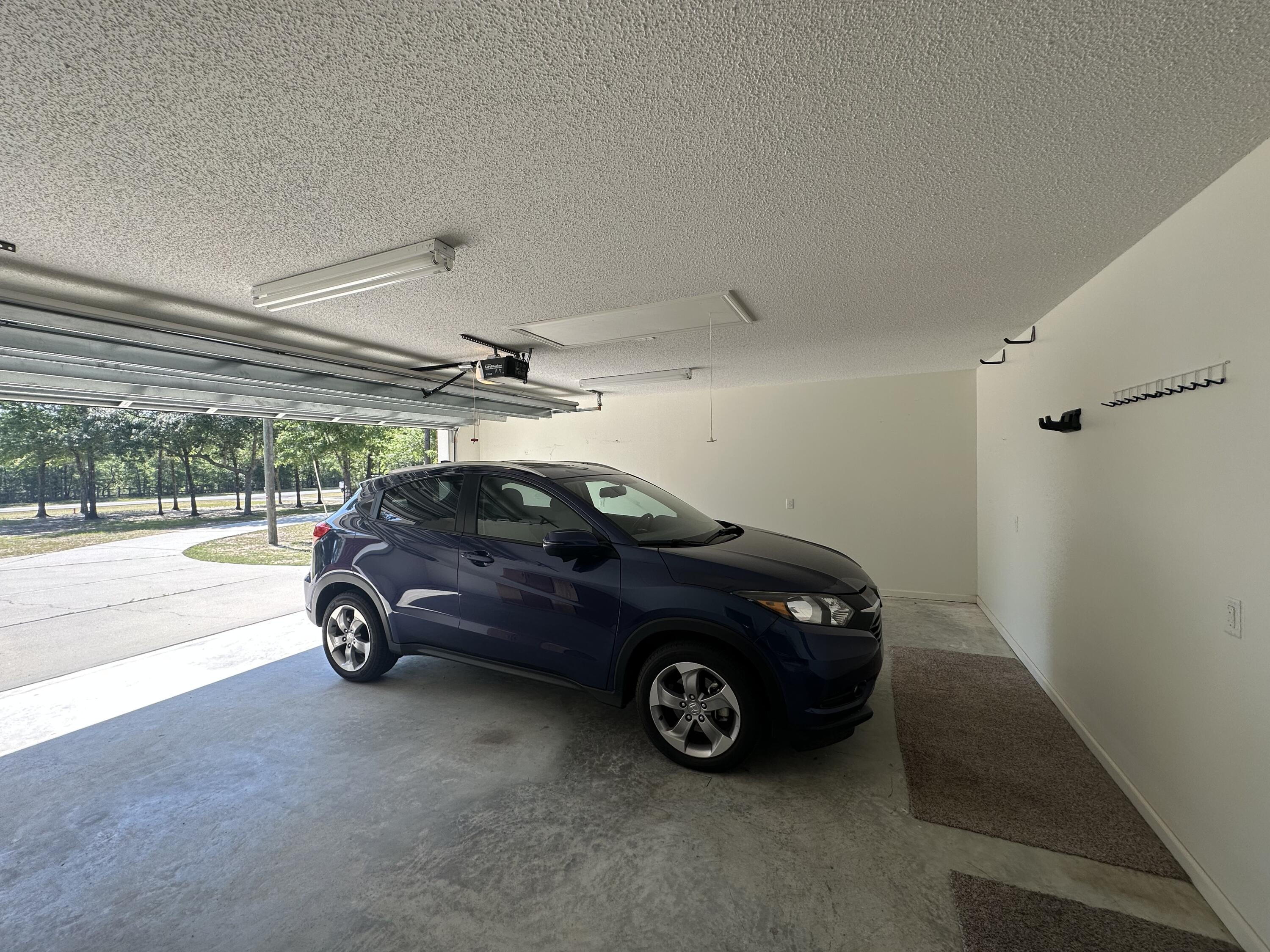 5570 Mt Olive Road Crestview, FL 32539 - Photo 33 of 34 a car parked in a parking