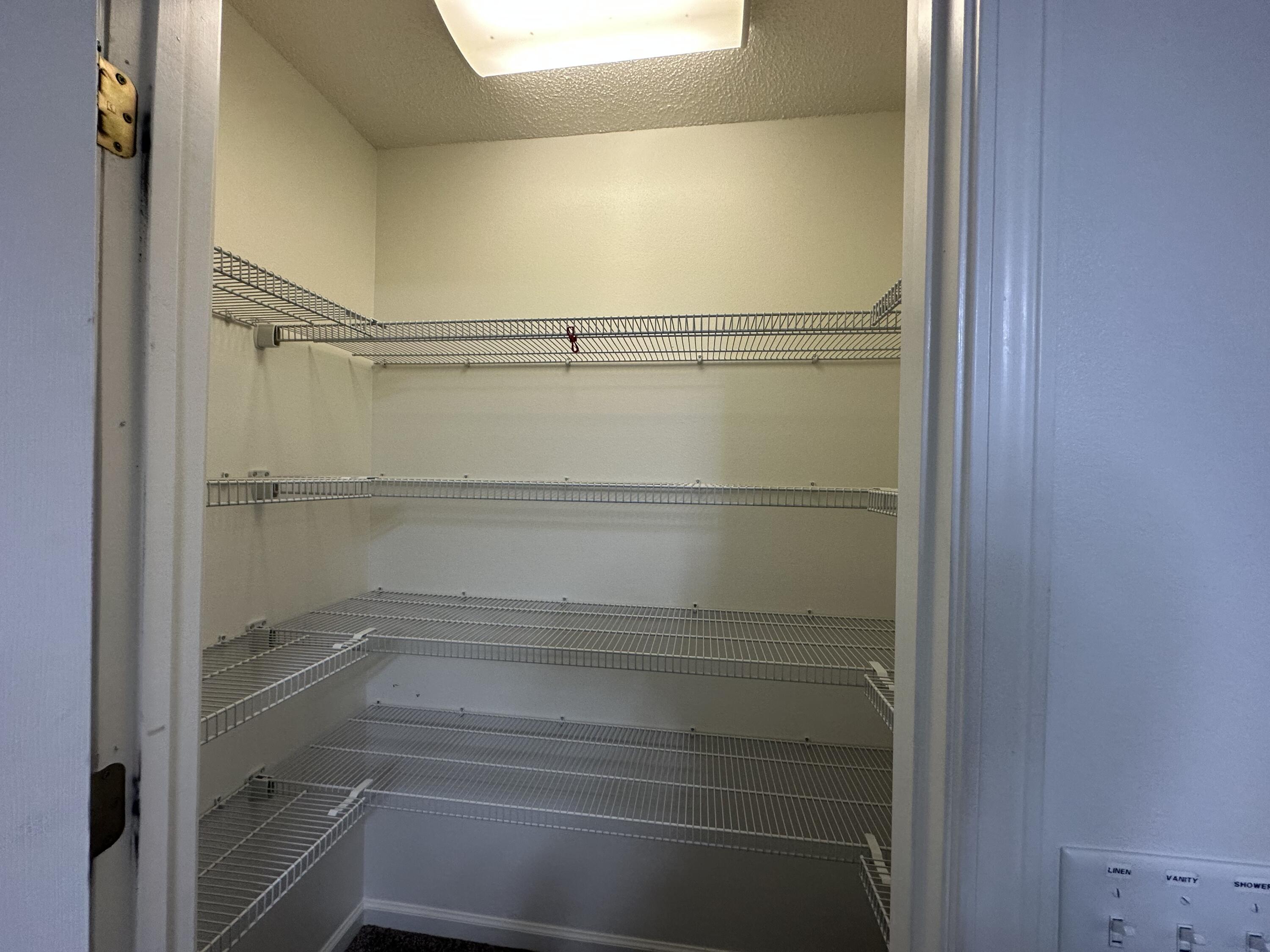 5570 Mt Olive Road Crestview, FL 32539 - Photo 9 of 34 a view of an empty walk in closet