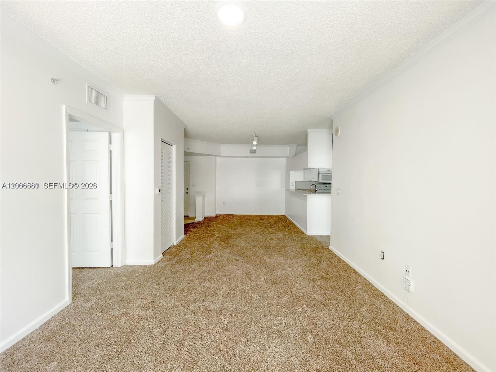 17150 North Bay Road, Unit 2602 Sunny Isles Beach, FL 33160 - Photo 7 of 27 a view of a kitchen with a sink and cabinets