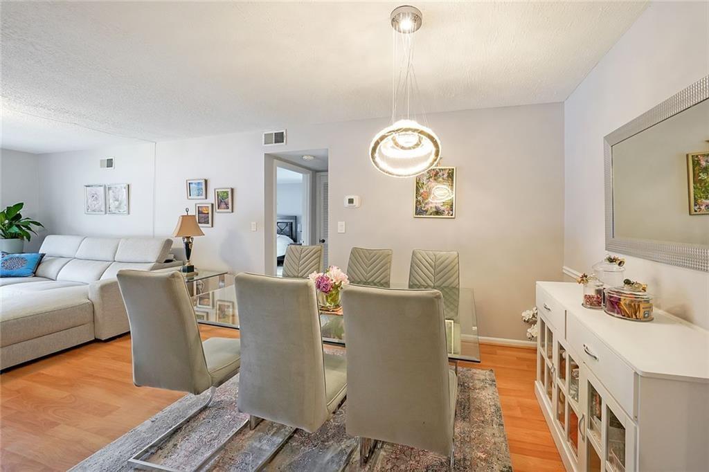 6851 Roswell Road, Unit O3 Atlanta, GA 30328 - Photo 15 of 30 a living room with furniture