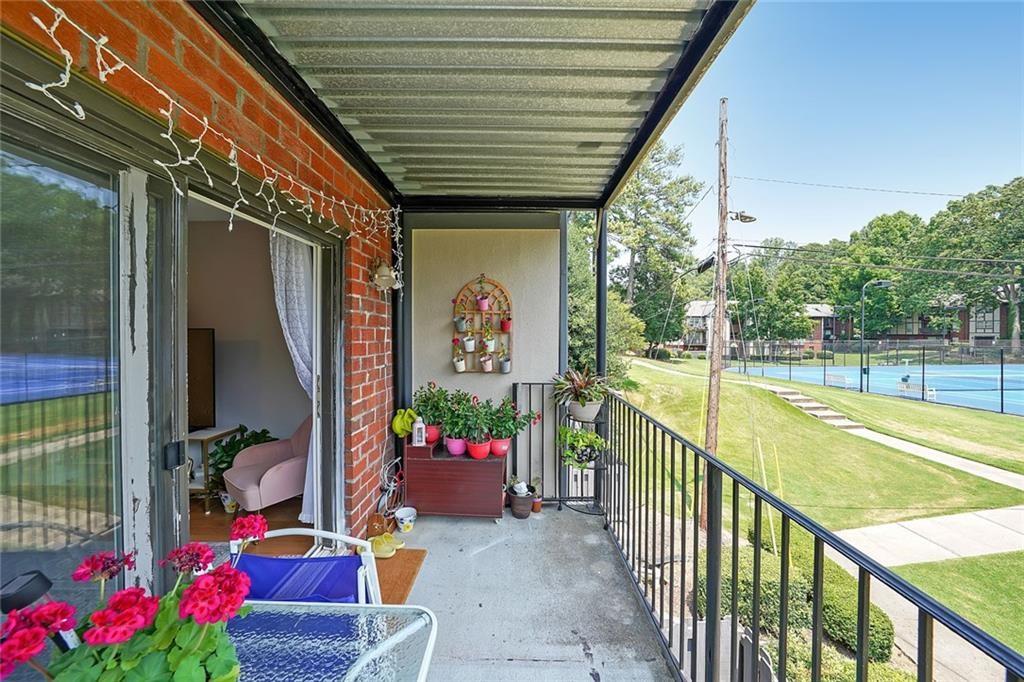 6851 Roswell Road, Unit O3 Atlanta, GA 30328 - Photo 23 of 30 a view of swimming pool with a patio