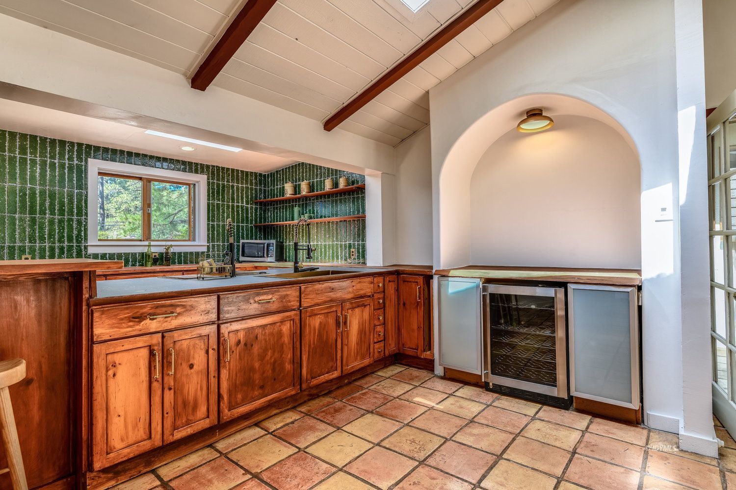 53155 Tollgate Road Idyllwild, CA 92549 - Photo 14 of 47 a kitchen with granite countertop a sink and cabinets