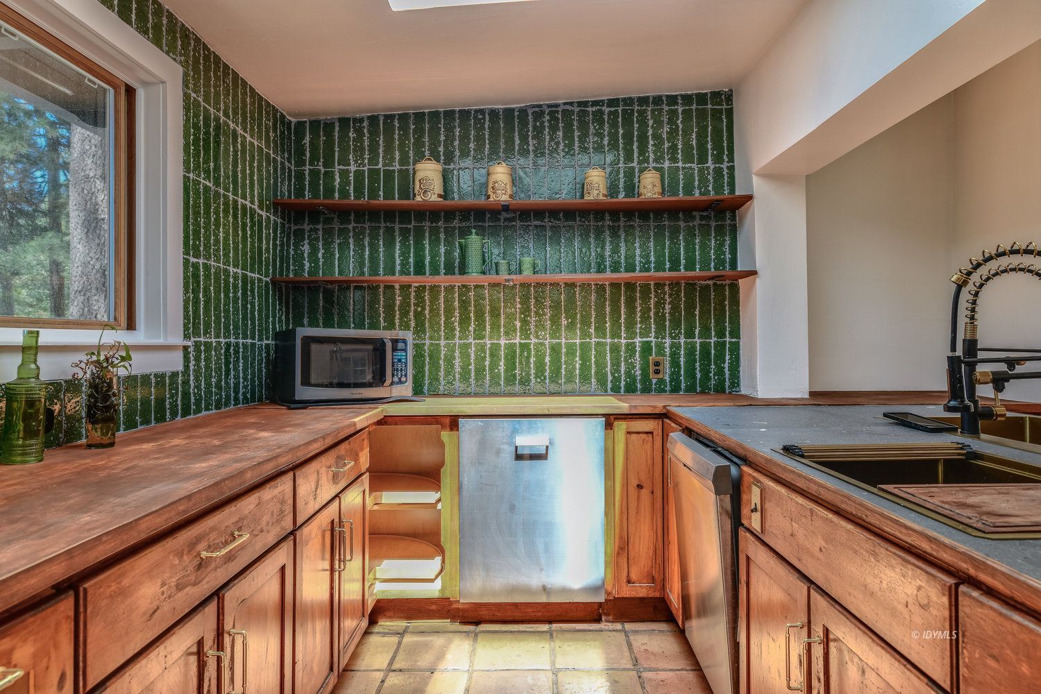53155 Tollgate Road Idyllwild, CA 92549 - Photo 15 of 47 a kitchen with a sink a counter top space and furniture