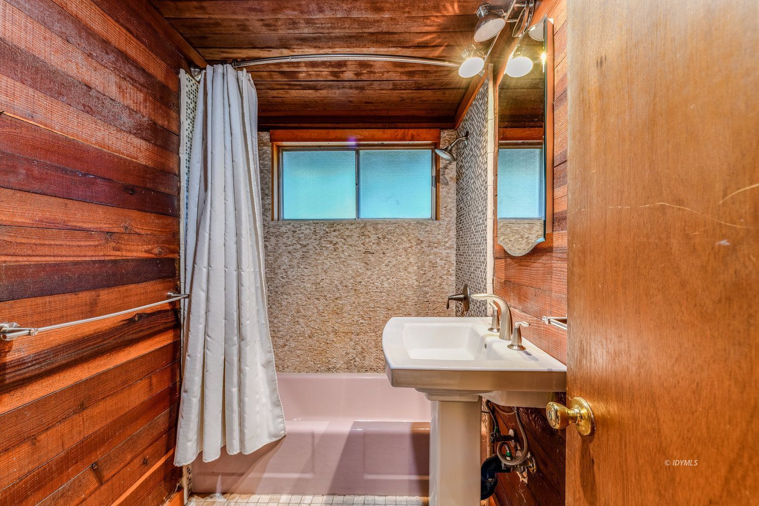 53155 Tollgate Road Idyllwild, CA 92549 - Photo 41 of 47 a bathroom with a sink and a mirror