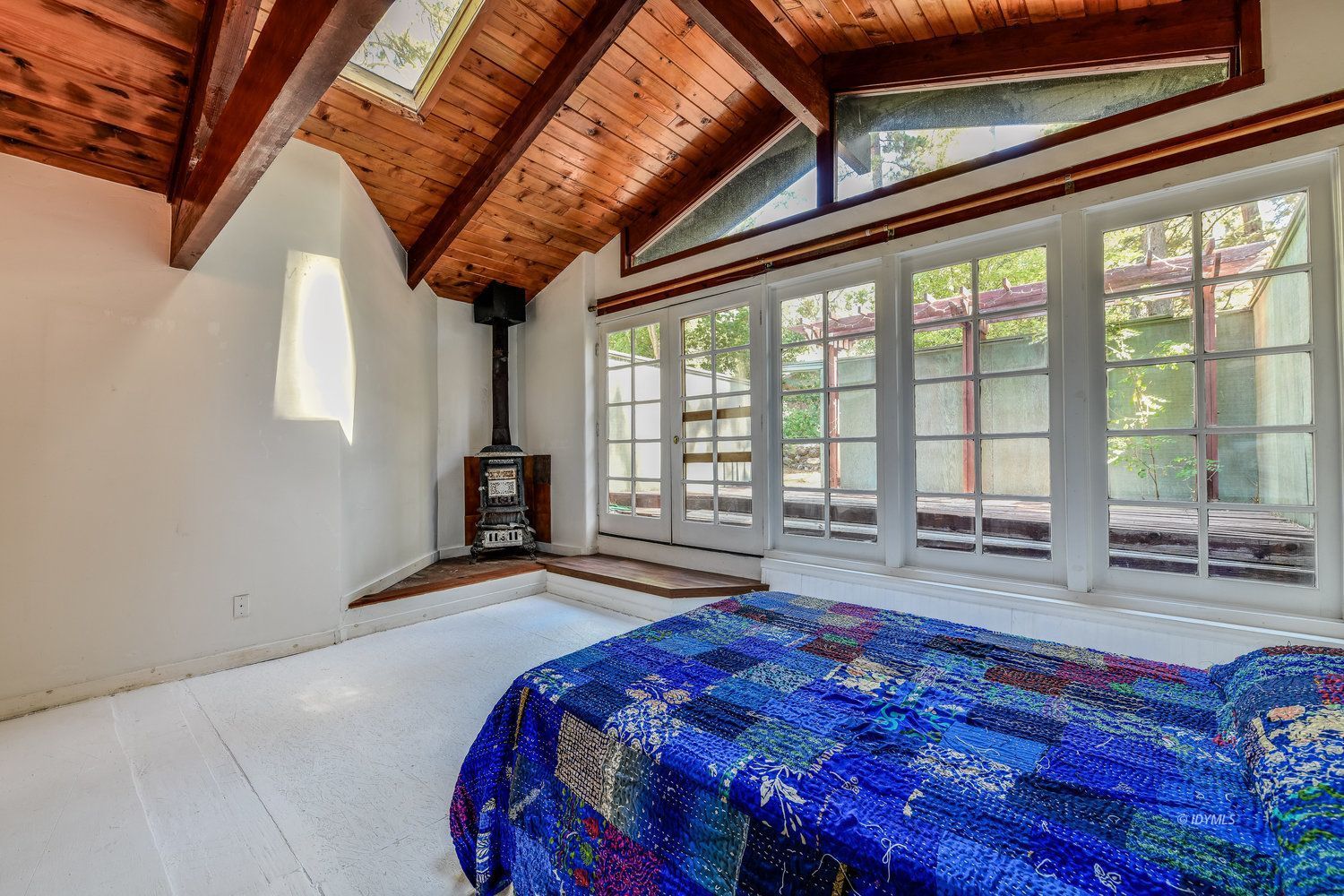 53155 Tollgate Road Idyllwild, CA 92549 - Photo 43 of 47 a bedroom with a bed and a large window