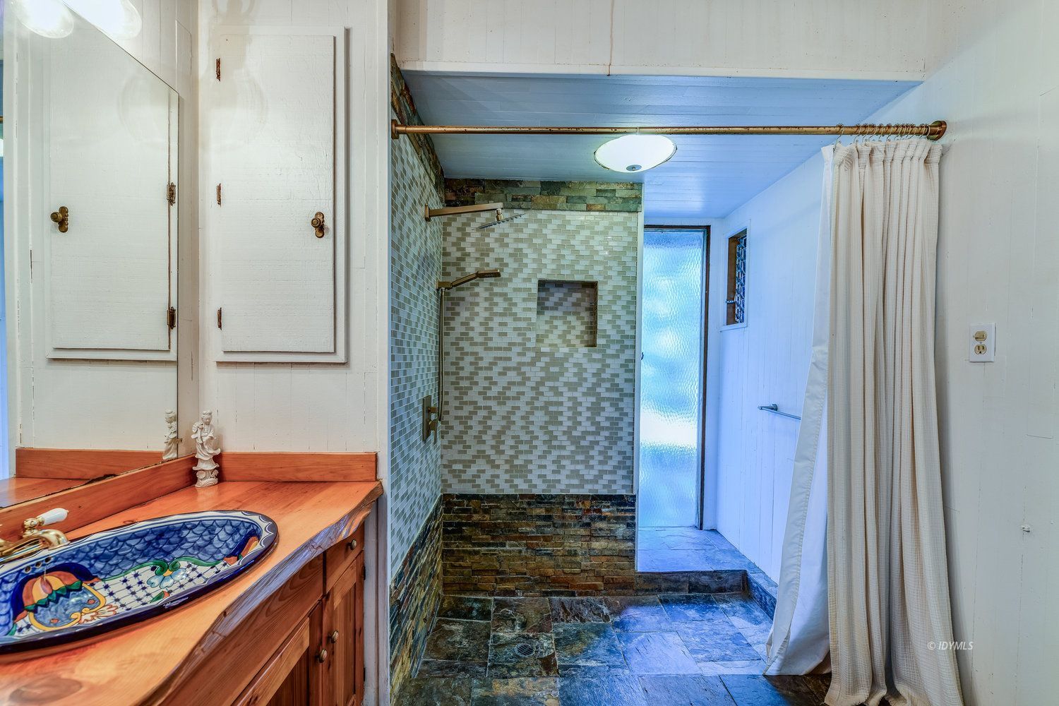 53155 Tollgate Road Idyllwild, CA 92549 - Photo 45 of 47 a bathroom with a tub and shower