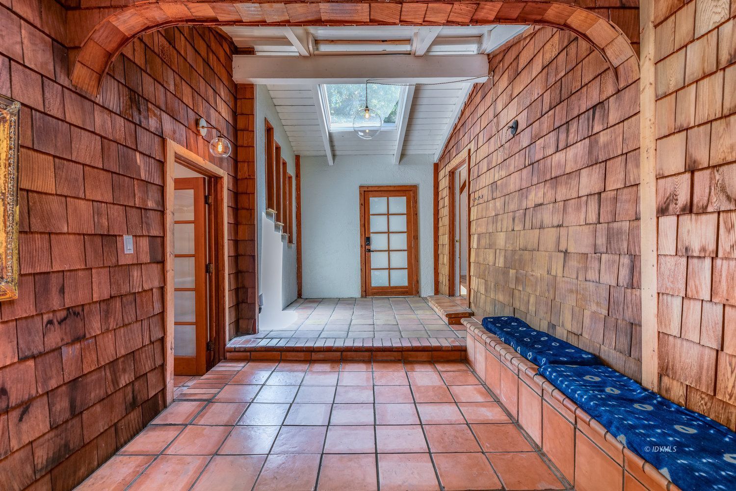 53155 Tollgate Road Idyllwild, CA 92549 - Photo 6 of 47 a view of a pathway with a brick wall