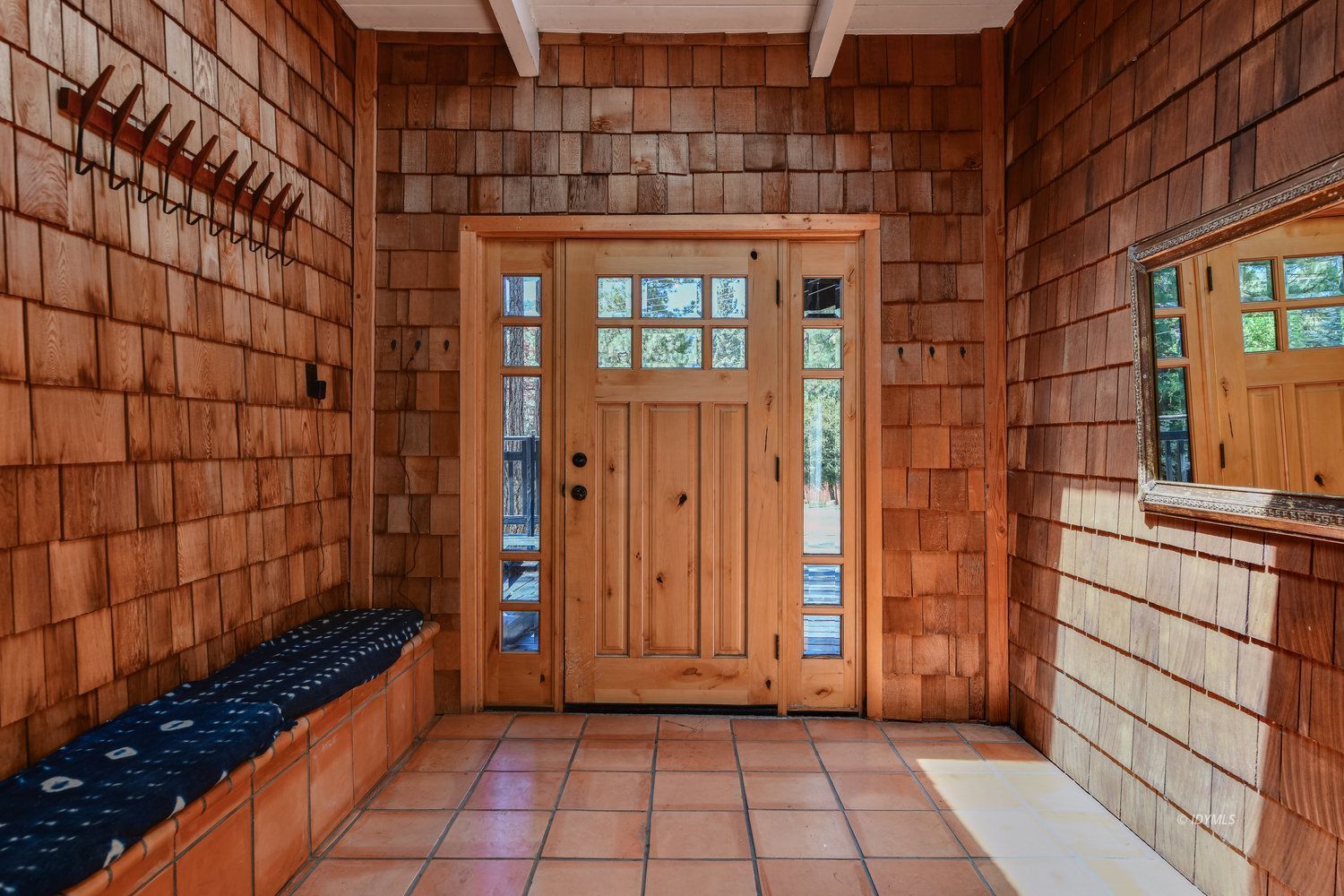 53155 Tollgate Road Idyllwild, CA 92549 - Photo 7 of 47 a view of a brick house with an empty room