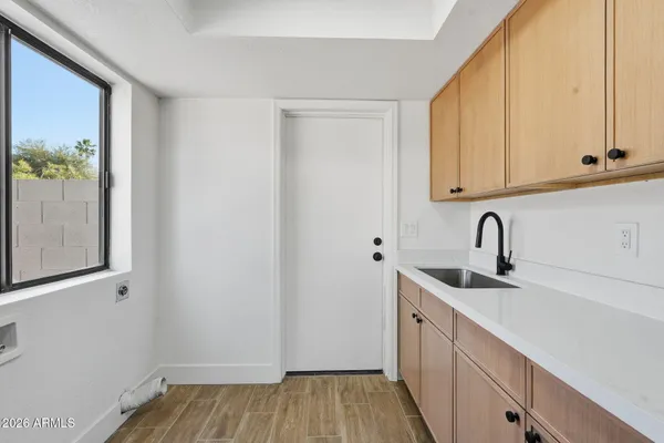 a view of an empty room with a window