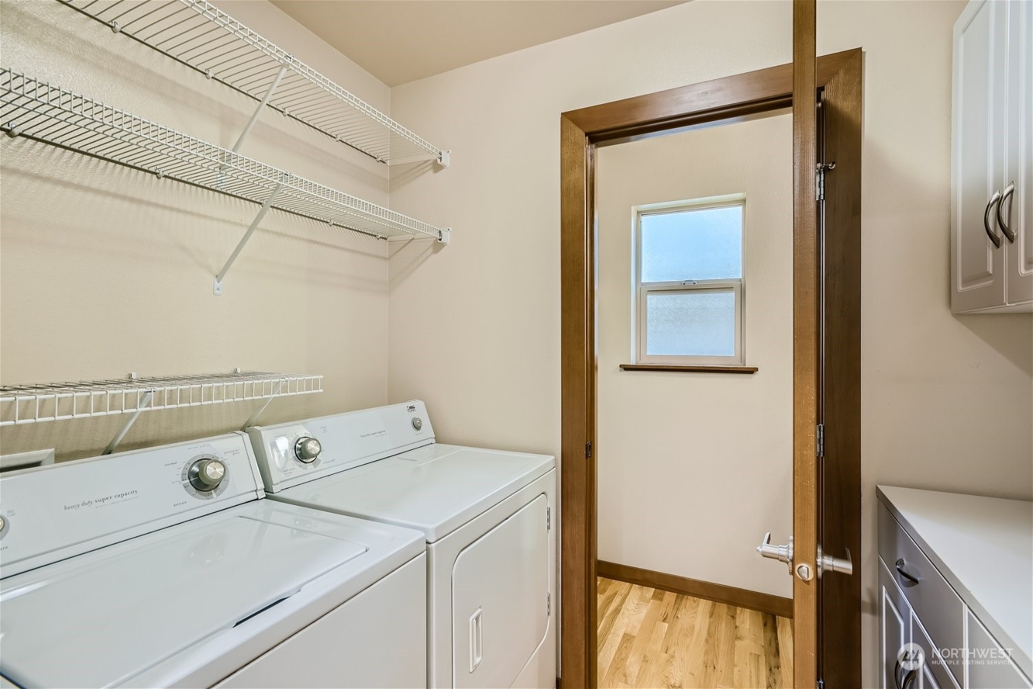 5935 California Avenue Southwest Seattle, WA 98136 - Photo 18 of 32 a utility room with dryer and washer