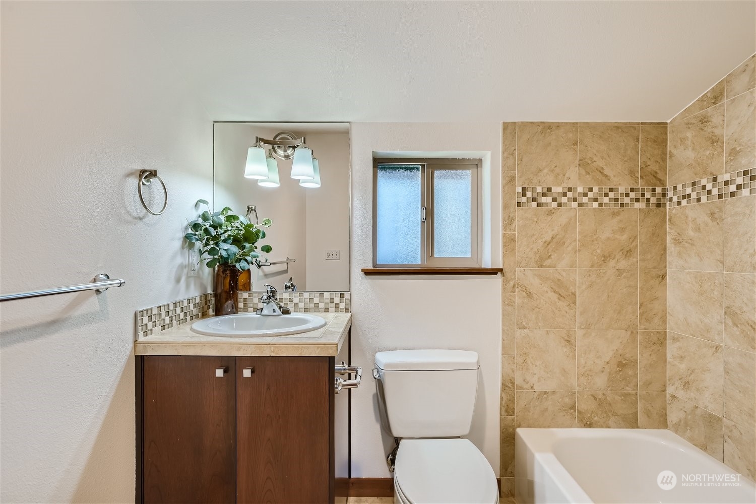 5935 California Avenue Southwest Seattle, WA 98136 - Photo 27 of 32 a bathroom with a sink toilet and shower