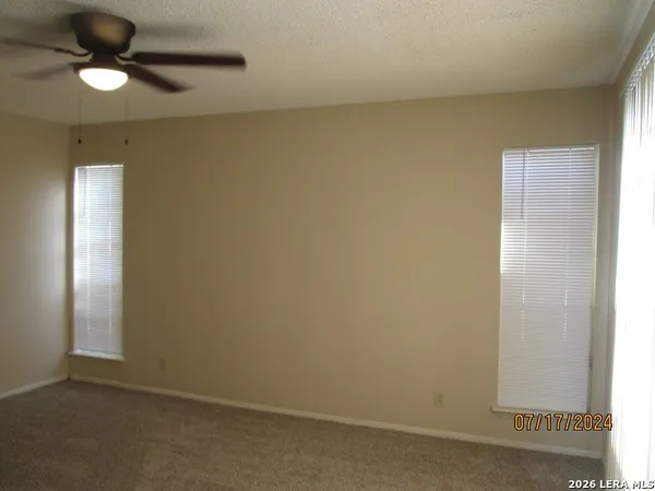 a view of a hallway with closet