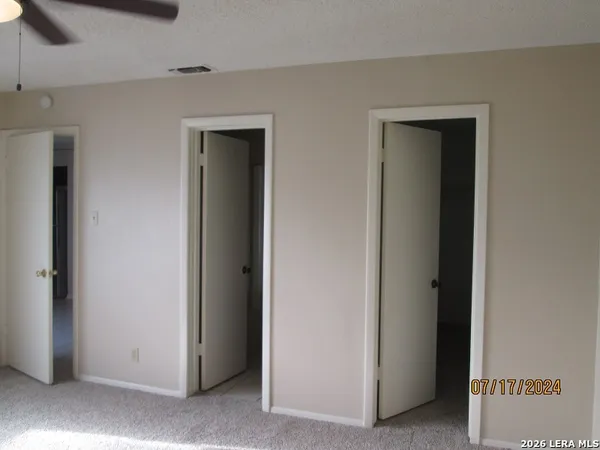 a view of small space with racks on the wall