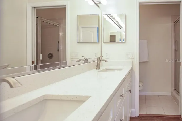 a bathroom with a bathtub and a sink