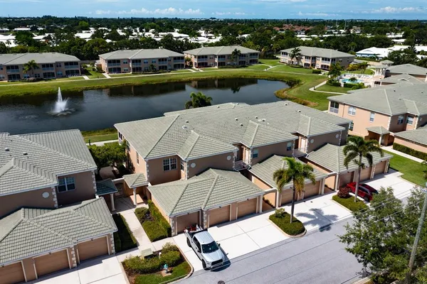 an aerial view of a houses with outdoor space