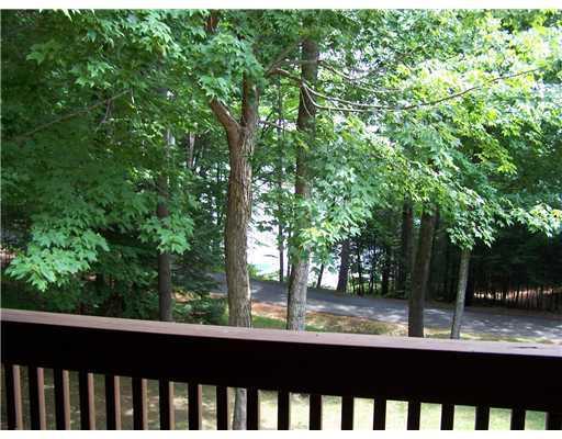 76 Trickey Pond Road Naples, ME 04055 - Photo 21 of 23 Patio/Deck. Deck looks out at...