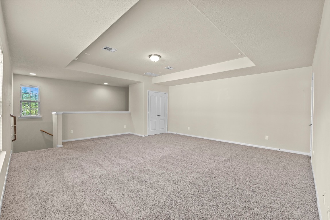 39 Butternut Grove Place Tomball, TX 77375 - Photo 26 of 29 a view of an empty room