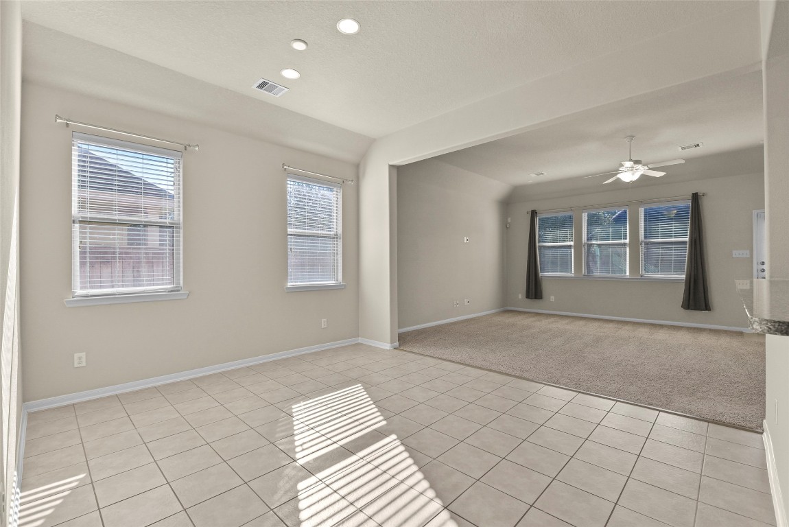 39 Butternut Grove Place Tomball, TX 77375 - Photo 6 of 29 a view of an empty room with a window