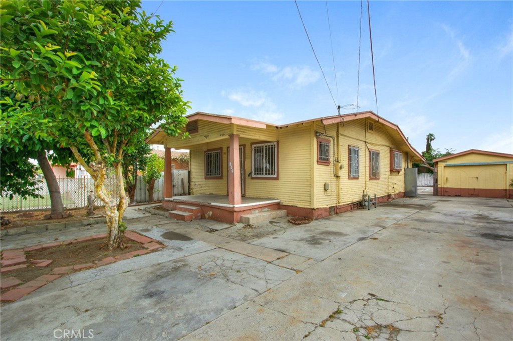 502 North Rose Avenue Compton, CA 90221 - Photo 1 of 1 a view of a large house with wooden fence