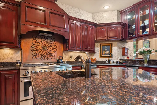 a large bathroom with a shower and a sink